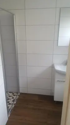 Ein Badezimmer in der Unterkunft Pension Dreger