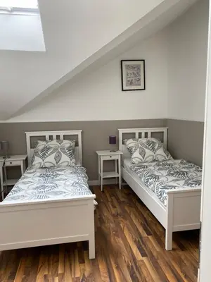 Ein Bett oder Betten in einem Zimmer der Unterkunft Ferienwohnung Schantz