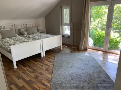 Ein Bett oder Betten in einem Zimmer der Unterkunft Ferienwohnung Schantz