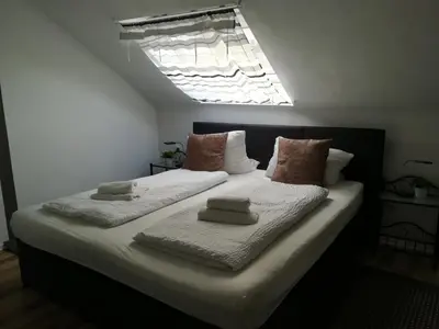 Ein Bett oder Betten in einem Zimmer der Unterkunft Hotel Ari