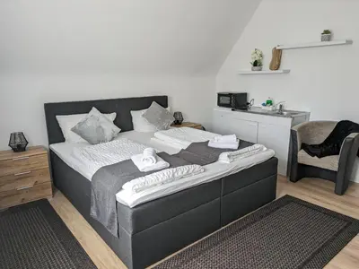 Ein Bett oder Betten in einem Zimmer der Unterkunft Hotel Ari