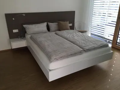 Ein Bett oder Betten in einem Zimmer der Unterkunft Lumina Apartments