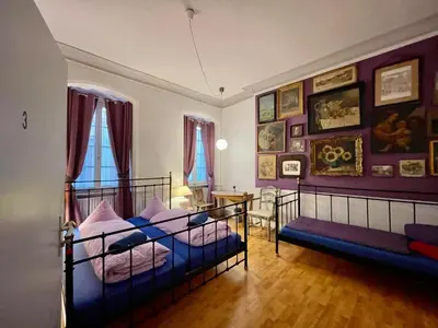 Ein Bett oder Betten in einem Zimmer der Unterkunft Pension Jeske Heidelberg