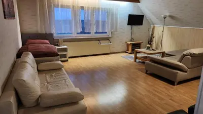 Ein Sitzbereich in der Unterkunft Monteurwohnung Ha-Wei -90 m2