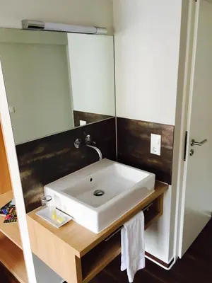 Ein Badezimmer in der Unterkunft Brauereigasthof Krone Öhringen