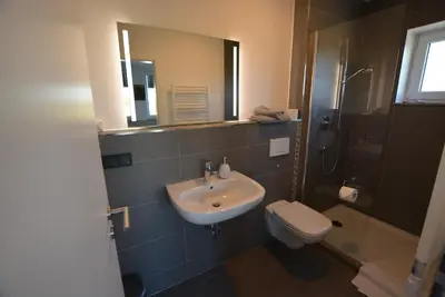 Ein Badezimmer in der Unterkunft GS DiePension