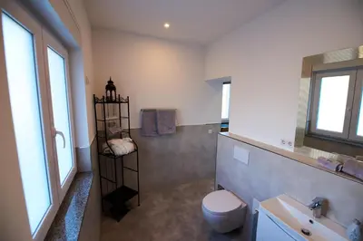 Ein Badezimmer in der Unterkunft Business Apartments Höfle