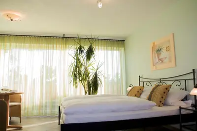 Ein Bett oder Betten in einem Zimmer der Unterkunft Porta Vinea