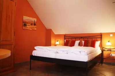 Ein Bett oder Betten in einem Zimmer der Unterkunft Porta Vinea