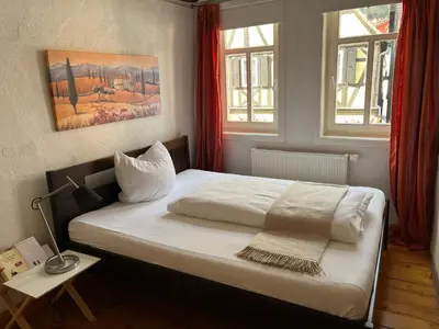 Ein Bett oder Betten in einem Zimmer der Unterkunft Boarding House Obernburg