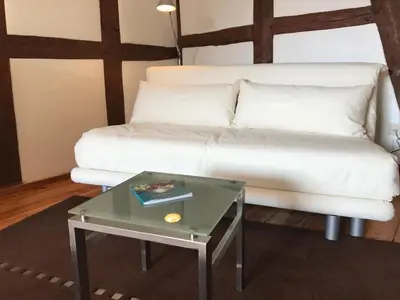 Ein Sitzbereich in der Unterkunft Boarding House Obernburg