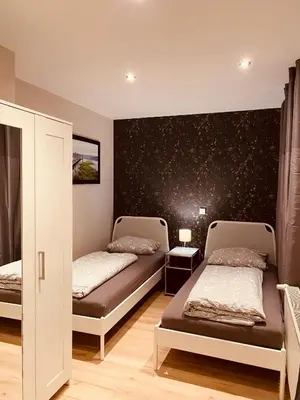 Ein Bett oder Betten in einem Zimmer der Unterkunft Apartment End