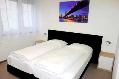 Ein Bett oder Betten in einem Zimmer der Unterkunft Budget Hotel Ludwigshafen
