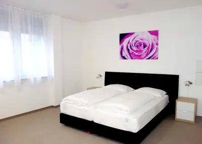 Ein Bett oder Betten in einem Zimmer der Unterkunft Budget Hotel Ludwigshafen