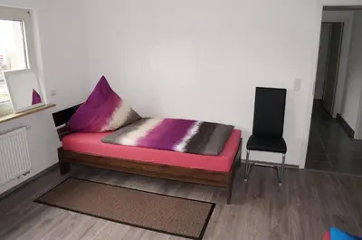 Ein Bett oder Betten in einem Zimmer der Unterkunft SoNi Apartment