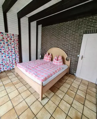 Ein Bett oder Betten in einem Zimmer der Unterkunft Villa Josy
