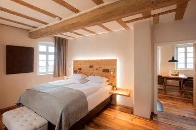 Ein Bett oder Betten in einem Zimmer der Unterkunft Burggarten Appartements Neuleiningen