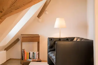 Ein Sitzbereich in der Unterkunft Burggarten Appartements Neuleiningen