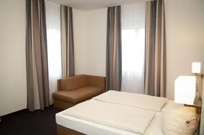 Ein Bett oder Betten in einem Zimmer der Unterkunft Gasthaus zum Ochsen