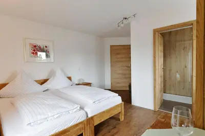 Ein Bett oder Betten in einem Zimmer der Unterkunft Pension Christina