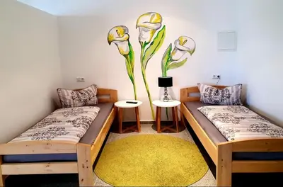 Ein Bett oder Betten in einem Zimmer der Unterkunft Gästeappartements Bierfässl