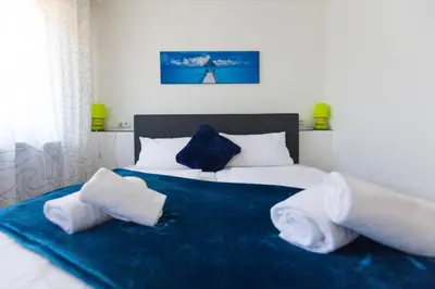 Ein Bett oder Betten in einem Zimmer der Unterkunft Hotel Berlin