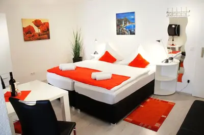 Ein Bett oder Betten in einem Zimmer der Unterkunft Hotel Berlin