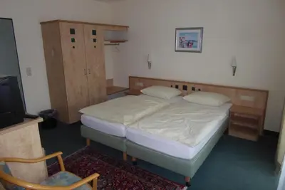 Ein Bett oder Betten in einem Zimmer der Unterkunft Hotel Ring Park