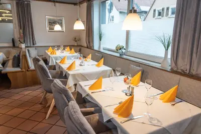 Ein Restaurant oder anderes Speiselokal in der Unterkunft Neckarperle