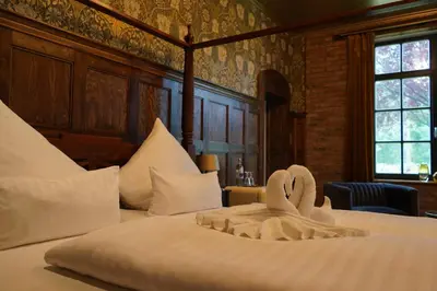 Ein Bett oder Betten in einem Zimmer der Unterkunft Hofgut Holzmuhle