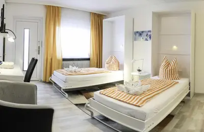 Ein Bett oder Betten in einem Zimmer der Unterkunft Apartment in Innenstadtnähe