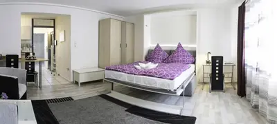 Ein Bett oder Betten in einem Zimmer der Unterkunft Apartment in Innenstadtnähe