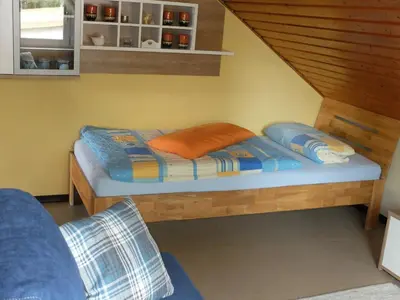 Ein Bett oder Betten in einem Zimmer der Unterkunft Schöne Aussicht
