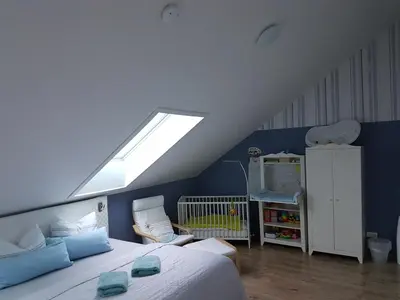 Ein Bett oder Betten in einem Zimmer der Unterkunft Ferienwohnung Grewe