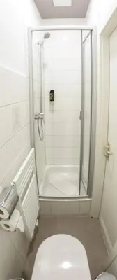 Ein Badezimmer in der Unterkunft Hotel Mille Stelle City