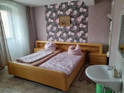 Ein Bett oder Betten in einem Zimmer der Unterkunft Gasthaus Zur Rose
