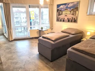 Ein Bett oder Betten in einem Zimmer der Unterkunft Ludwig Apartment