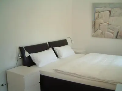 Ein Bett oder Betten in einem Zimmer der Unterkunft Appartement Kirschgarten Mainz Rochusstraße
