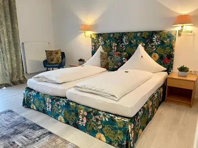 Ein Bett oder Betten in einem Zimmer der Unterkunft Hotel zum Engel