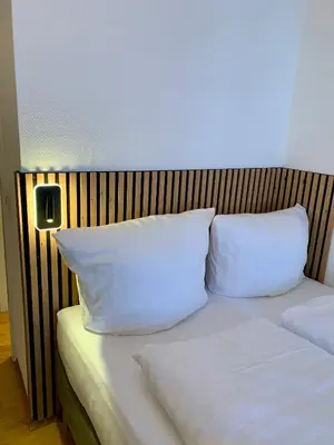 Ein Bett oder Betten in einem Zimmer der Unterkunft Hotel Zum Pfalzgrafen
