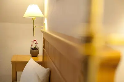 Ein Bett oder Betten in einem Zimmer der Unterkunft Hotel Grünshof