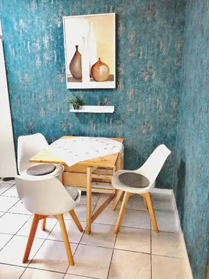 Ein Sitzbereich in der Unterkunft Ferienwohnung Drehwald
