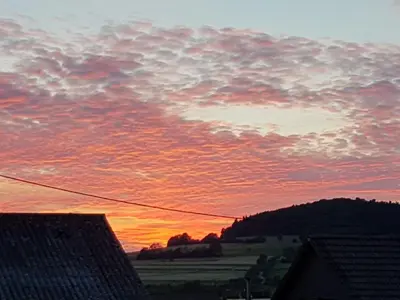 Blick auf den Sonnenuntergang/Sonnenaufgang von der Ferienwohnung aus oder aus der Nähe