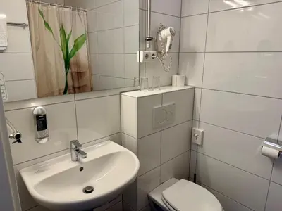 Ein Badezimmer in der Unterkunft Gästehaus Haßloch/Pfalz