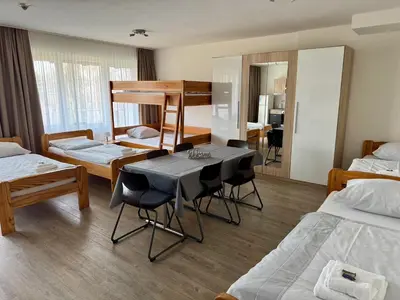 Ein Bett oder Betten in einem Zimmer der Unterkunft Gästehaus Haßloch/Pfalz