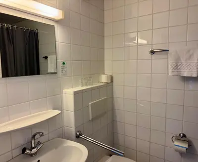 Ein Badezimmer in der Unterkunft Gästehaus Haßloch/Pfalz