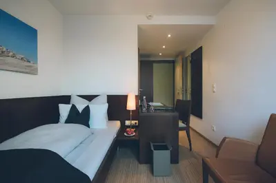 Ein Bett oder Betten in einem Zimmer der Unterkunft Das Wildeck Hotel & Restaurant
