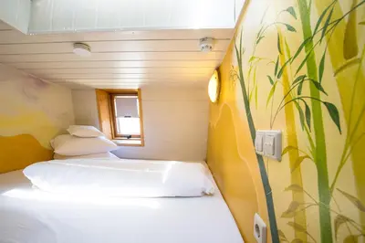 Ein Bett oder Betten in einem Zimmer der Unterkunft Kubler Stars