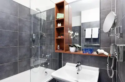 Ein Badezimmer in der Unterkunft Hotel City Oase Lb