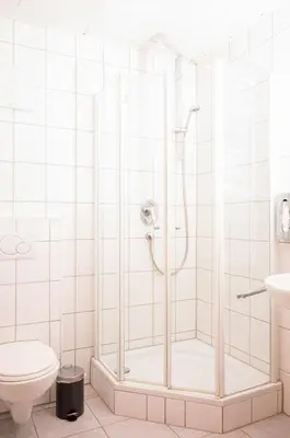 Ein Badezimmer in der Unterkunft Hotel Restaurant Zehntscheune